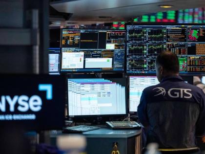 Specialist Dilip Patel on the floor of the New York Stock Exchange on August 24.  
