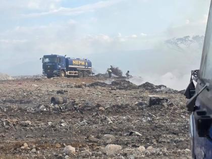 Work crews responding to a fire at the Haddon disposal facility in Moneague, St Ann