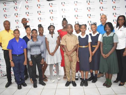 WINDALCO representatives (from left) – Community Relations Administrator Winston Watson; Employee and Community Relations Manager Lanceroy Morris; Port Manager Art Banton, and Snr Information & Public Affairs Officer Monique Grange, with PEP scholarship 