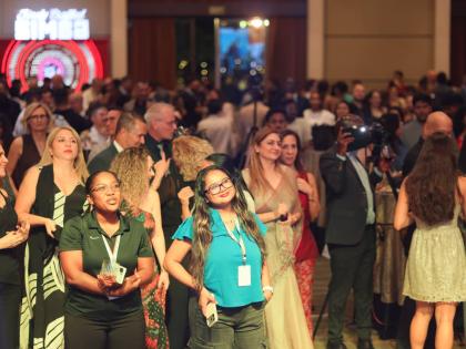 Guests enjoy a performance by singer Hezron at a recent Jamaica Independence celebration gala in New Delhi, India.