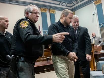 Jeriah Mast, a former missionary for Christian Aid Ministries, is taken into custody after his sentencing at Holmes County Courthouse in Millersburg, Ohio, in November 2019.