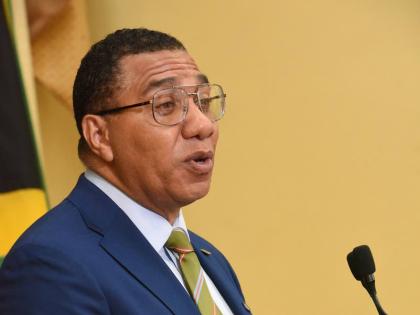 Prime Minister Dr Andrew Holness addresses the audience during the official launch of the Jamaica Reconstruction and Resilience Oversight Committee on Tuesday. 