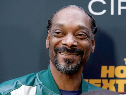 Snoop Dogg poses at the premiere of ‘The House Next Door: Meet The Blacks 2’, on June 7, 2021, in Los Angeles. 