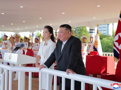 In this photo provided by the North Korean government, its leader Kim Jong Un and his daughter attend a commissioning ceremony of a destroyer, Kang Kon at a port in Wonsan, North Korea Sunday, September 6.