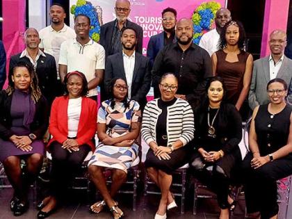 Tourism Enhancement Fund (TEF) Executive Director Dr Carey Wallace (second left), University of Technology, Jamaica President Dr Kevin Brown (second right), TEF Director of Research and Risk Management Gis’elle Jones-Shepherd (front right), and members o