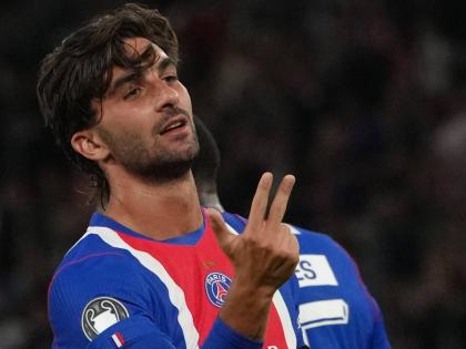 PSG’s Ferran Torres celebrates after scoring his third goal during the Champions League opening-phase football match against Slovan Bratislava in Paris on Wednesday.