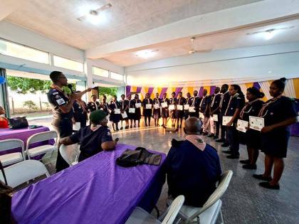 Kevin Richards (centre), chief commissioner of the Scout Association of Jamaica, congratulates newly recognised leaders who earned their Wood Badge and joined the national and international fellowship of Gilwellians.
