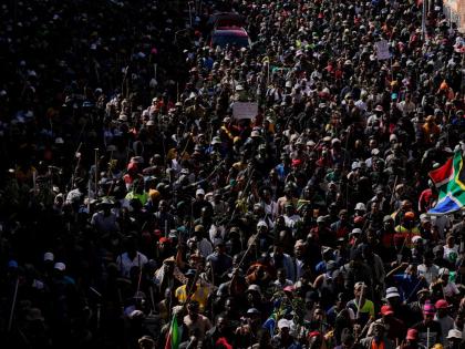 Protesters march against illegal immigration, in Johannesburg, South Africa, on June 30.
