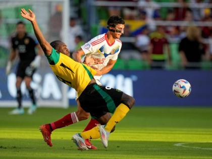 Jamaica’s Michail Antonio, left, and Venezuela’s Yordan Osorio compete for the ball during a Copa America Group B soccer match between Jamaica and Venezuela, Sunday, June 30, 2024, in Austin, Texas. 