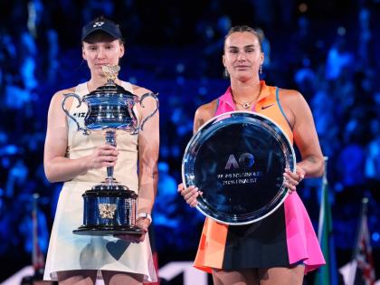  Elena Rybakina (left) of Kazakhstan, holds the Daphne Akhurst Memorial Cup after defeating Aryna Sabalenka (right) of Belarus, in the women’s singles final at the Australian Open tennis championship in Melbourne, Australia, January 31, 2026. 