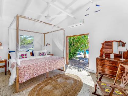 A peaceful bedroom in a seafront setting. 