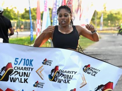 
Dandie Williams celebrates victory in the 5K Run at the MBJ Charity Run/Walk at Sangster International Airport in Montego Bay on Sunday, September 6.