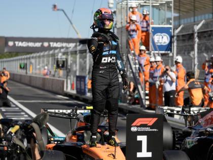 
McLaren driver Lando Norris of Britain celebrates his pole position after the qualifying session for the Spanish Formula One Grand Prix in Madrid, yesterday.