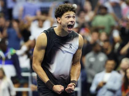 
Ben Shelton, of the United States, celebrates after winning against Carlos Alcaraz, of Spain, in the quarterfinal round of the U.S. Open tennis championships on Wednesday.