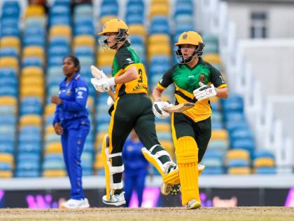 
Jamaica Empress’ Meg Lanning (centre) and Amy Hunter (right) go for a single during their Limacol Women’s Caribbean Premier League game against the Barbados Tridents at the Kensington Oval yesterday. Looking on is Tridents spinner, Afy Fletcher.