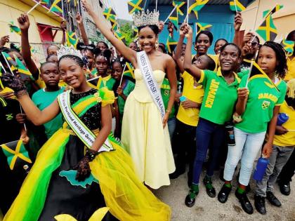 Portlanders came out in their national colours last Friday to cheer on newly-crowned Miss Universe Jamaica Celene Hall.
