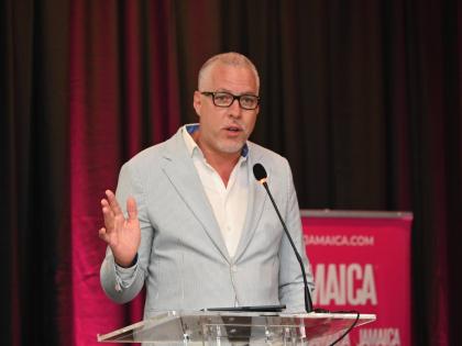 Deputy Director of Tourism for the Americas, Phillip Rose addressing delegates at the opening forum of the Jamaica Product Exchange in Ocho Rios, St Ann, on Monday.