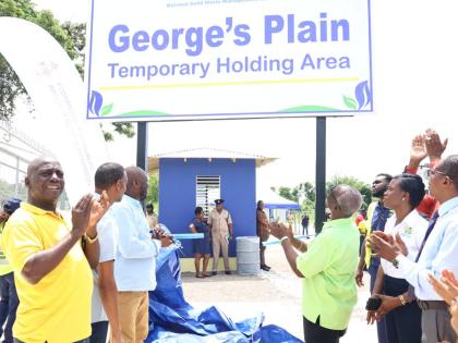 From left: Audley Gordon, executive director of the National Solid Waste Management Authority (NSWMA); Dwayne Vaz, Member of Parliament for Central Westmoreland; Danree Delancy, Mayor of Savanna-la-Mar; and Desmond McKenzie, Minister of Local Government an