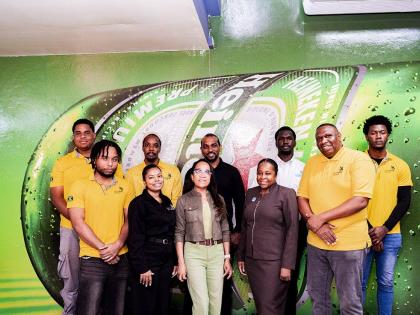 Dianne Ashton Smith, head of corporate affairs at Red Stripe (front centre), joins the WorldSkills Jamaica competitors and HEART/NSTA Trust executives during a visit to Red Stripe. The competitors are preparing to represent Jamaica at WorldSkills, a global