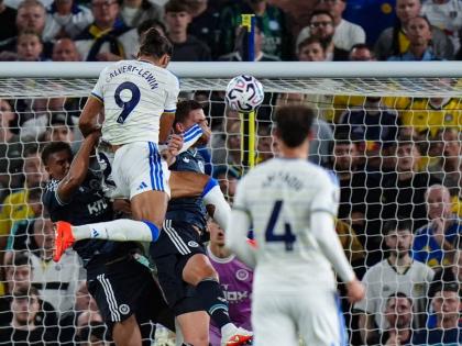 Leeds United’s Dominic Calvert-Lewin (top) scores during the English Premier League football match against Newcastle United in Leeds, England, yesterday.