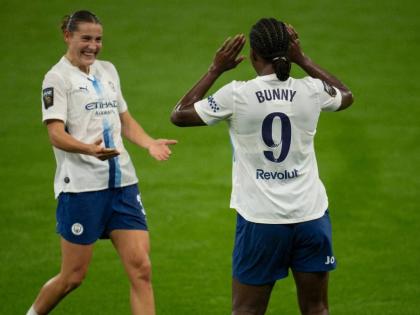 Manchester City’s Khadija Shaw (right) celebrates scoring a goal with Lauren Hemp during a Women’s Super League game against Aston Villa at Villa Park in Birmingham, England on Sunday. 