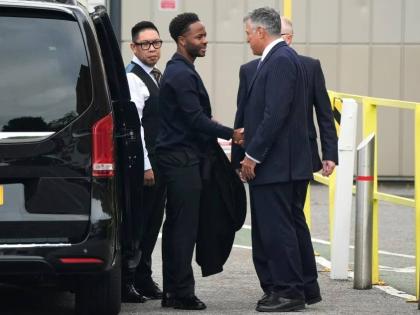Former England football player Raheem Sterling, second left, arrives at Basingstoke Magistrates’ Court ahead of his first appearance accused of dangerous driving in Hampshire, England, Tuesday, September 15, 2026. 