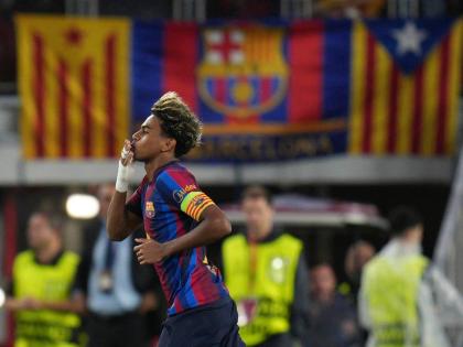 Barcelona’s Lamine Yamal celebrates after scoring his side’s fourth goal during the Champions League opening phase football game against Feyenoord in Barcelona, Spain, September 9.