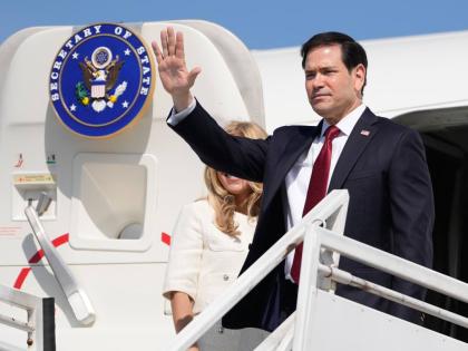 US Secretary of State Marco Rubio and his wife Jeanette Rubio depart the international airport Ernesto Cortissoz in Barranquilla, Colombia, September 9.