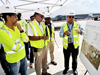 Caption: From left: Jorge Martinez, country manager of Cemex Jamaica and managing director of Carib Cement; Minister of Energy, Transport and Telecommunications Daryl Vaz; and Airports Authority of Jamaica Chairman Dr Douglas Lindo listen as PAC Kingston A