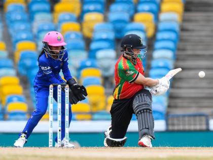 Barbados Tridents Women’s wicketkeeper Mandy Mangru (left) watches as Guyana Amazon Warriors Women’s Tazmin Brits plays a shot during their playoff game at the Kensington Oval in Barbados yesterday.