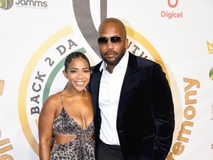 Jeffrey Campbell (right), more popularly known as recording artiste Agent Sasco, keeps it sharp in a velvet blazer and dark trousers, alongside his wife, Nicole McLaren-Campbell, founder and chief executive officer of AIM Educational Services, who wears a 