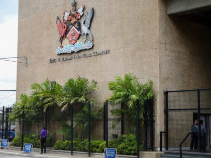 The country’s coat of arms hangs on the facade of a government building in Port-of-Spain, Trinidad and Tobago.