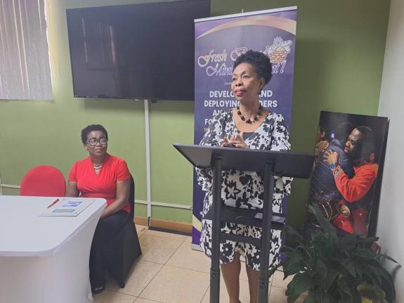 Olga Samuels (at podium), pastor of the Fresh Bread Ministries International [FBMI] nondenominational church in Montego Bay, St James, addresses the media launch of the Bishop Philemon Samuels Scholarship Fund, named in honour of the church’s late founde