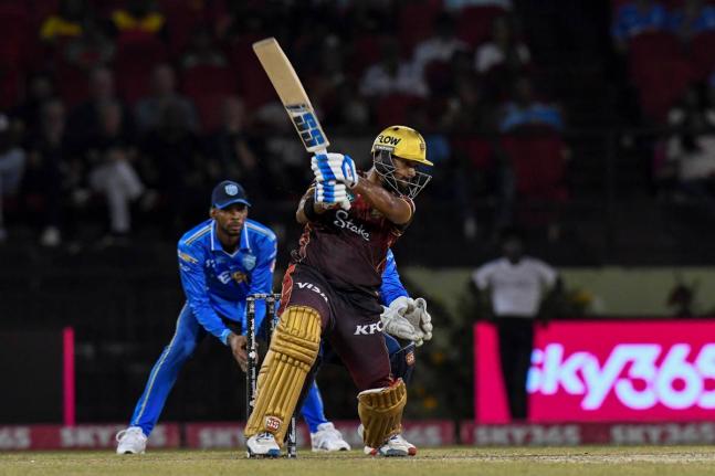 Courtesy of CPL 
Trinbago Knight Riders batsman Nicholas Pooran plays a cut shot on his way to an even 50 during the final Republic Bank Caribbean Premier League eliminator cricket match against the St Lucia Kings at the Providence Stadium in Guyana on Fri