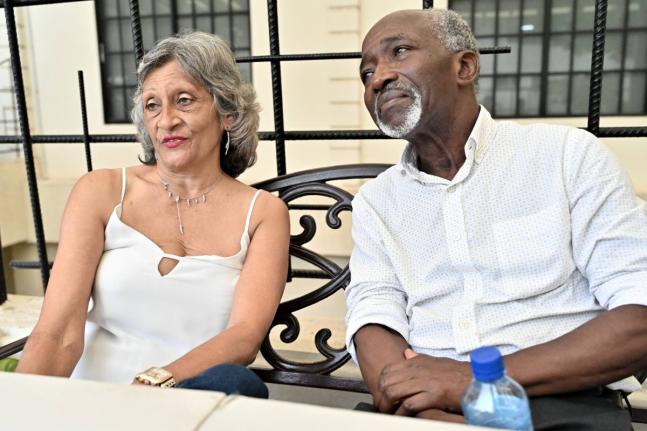 Barbara and Lincoln Robinson relate the terrifying encounter being swept away in their vehicle in raging floodwaters during a thunderstorm in New Kingston recently.