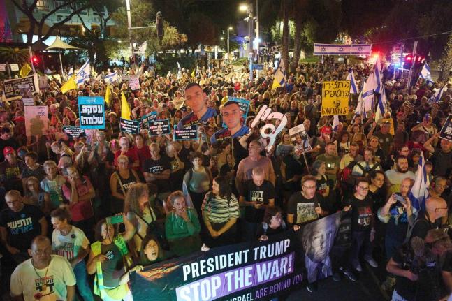Demonstrators march in Tel Aviv, Israel, on September 30, calling for the immediate release of all hostages held by Hamas in the Gaza Strip and an end to the ongoing war. 