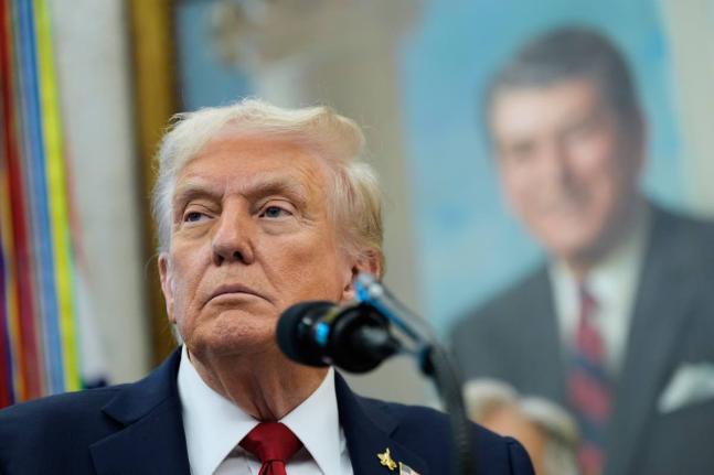 President Donald Trump speaks in the Oval Office of the White House, Tuesday, September 30, 2025, in Washington. (AP Photo/Alex Brandon)