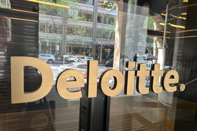 The log of Deloitte is displayed at their office in Melbourne, Australia, on Tuesday, October 7, 2025. (AP Photo/Rod McGuirk)