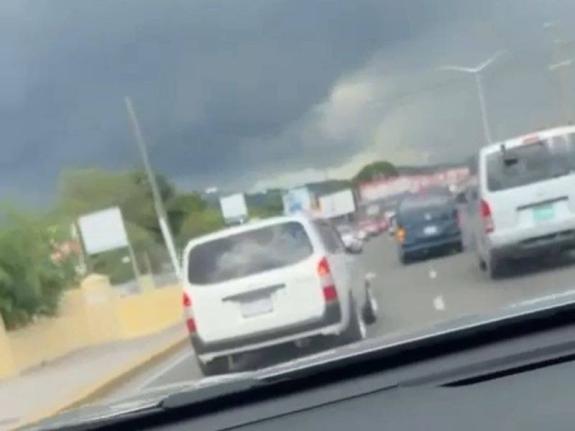 The incident involved a grey sport utility vehicle (SUV) and a white Toyota Probox.