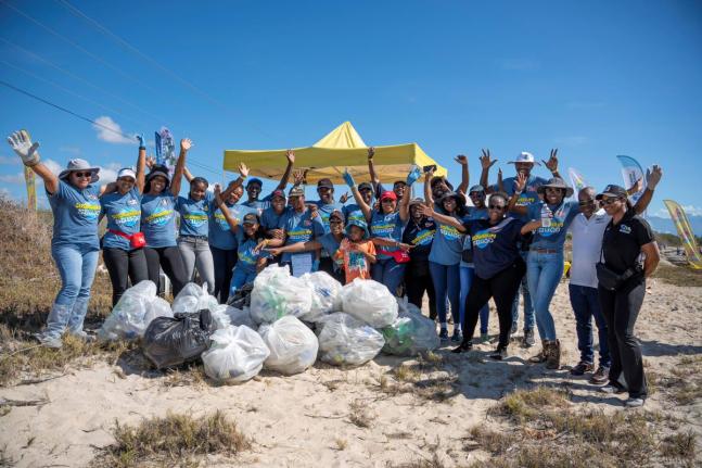 Some of the team members from Jamaica Broilers Group and its Best Dressed Chicken and Hi-Pro divisions, alongside NEPA’s Leonard Francis (second right), chief executive officer, and Monique Curtis (right), manager of Ecosystems Management Branch, after t