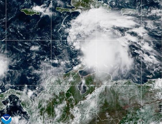 This NOAA satellite image taken at 11:40 a.m. EST on Tuesday, October 21, shows Tropical Storm Melissa in the Central Caribbean Sea. 