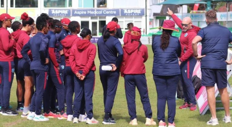 West Indies Women’s head coach, Shane Deitz (second right), gives instructions during a training session with players.