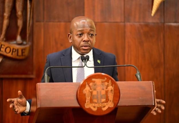 Minister of Labour and Social Security, Hon. Pearnel Charles Jr, addresses a special press briefing on preparations for Tropical Storm Melissa at the Office of the Prime Minister in Kingston on Wednesday.