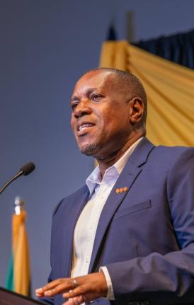 Paul Elliott, CEO, VM Building Society, delivers remarks at a diaspora forum in Florida in April. 