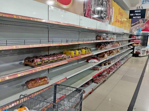 Partially empty shelves in a supermarket in Ocho Rios, St Ann on Friday, October 24, ahead of the passage of Tropical Storm Melissa.