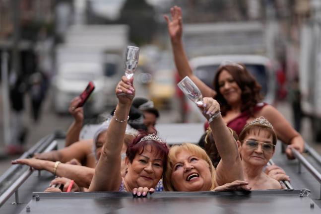 Blanca Guerrero (left) and Gloria Sanabria, both 67 (right) ride in a limousine to a quinceañera celebration for women who never had a traditional 15th birthday party, organised by the Suenos Hechos Foundation in Bogotá, Colombia.