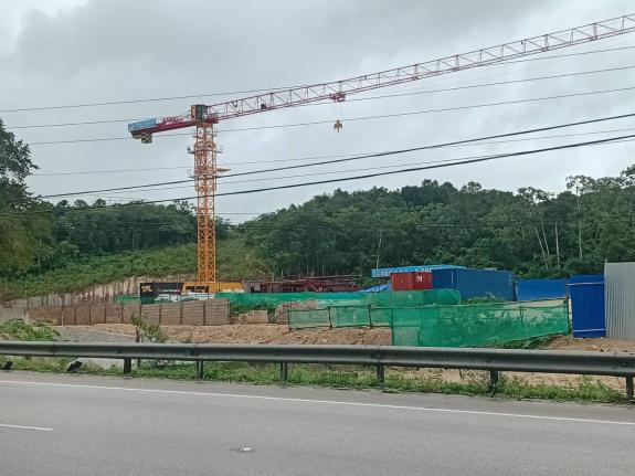 A crane towers above unfinished buildings at a construction site in Mammee Bay, St Ann on October 26, 2025. 