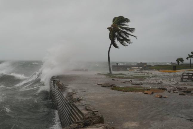 Waves splash in Kingston, Jamaica, as Hurricane Melissa approaches, Tuesday, October 28, 2025. (AP Photo/Matias Delacroix)