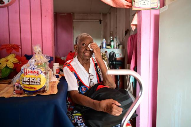 Ruth Lyn Deer is moved to tears as she recounts her experience during Hurricane Melissa, which led to a section of her roof being ripped off her home in Lacovia. 