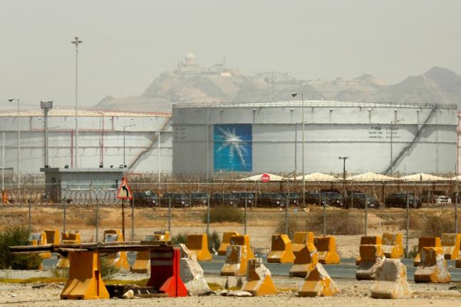 Storage tanks are seen at the North Jeddah bulk plant, an Aramco oil facility, in Jeddah, Saudi Arabia, on March 21, 2021.